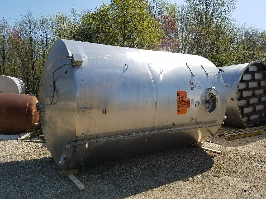 ***SOLD*** used 6,000 gallon sanitary stainless steel jacketed storage tank manuf by Cherry Burrell.  Dish top, flat slope bottom. Approx. 9' ID and 9'6